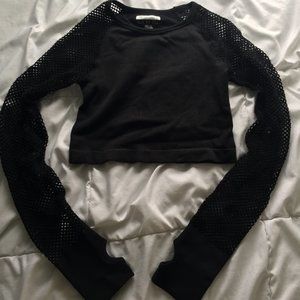 Black crop top with fishnet sleeves